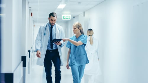 doctor and nurse walking down the hall