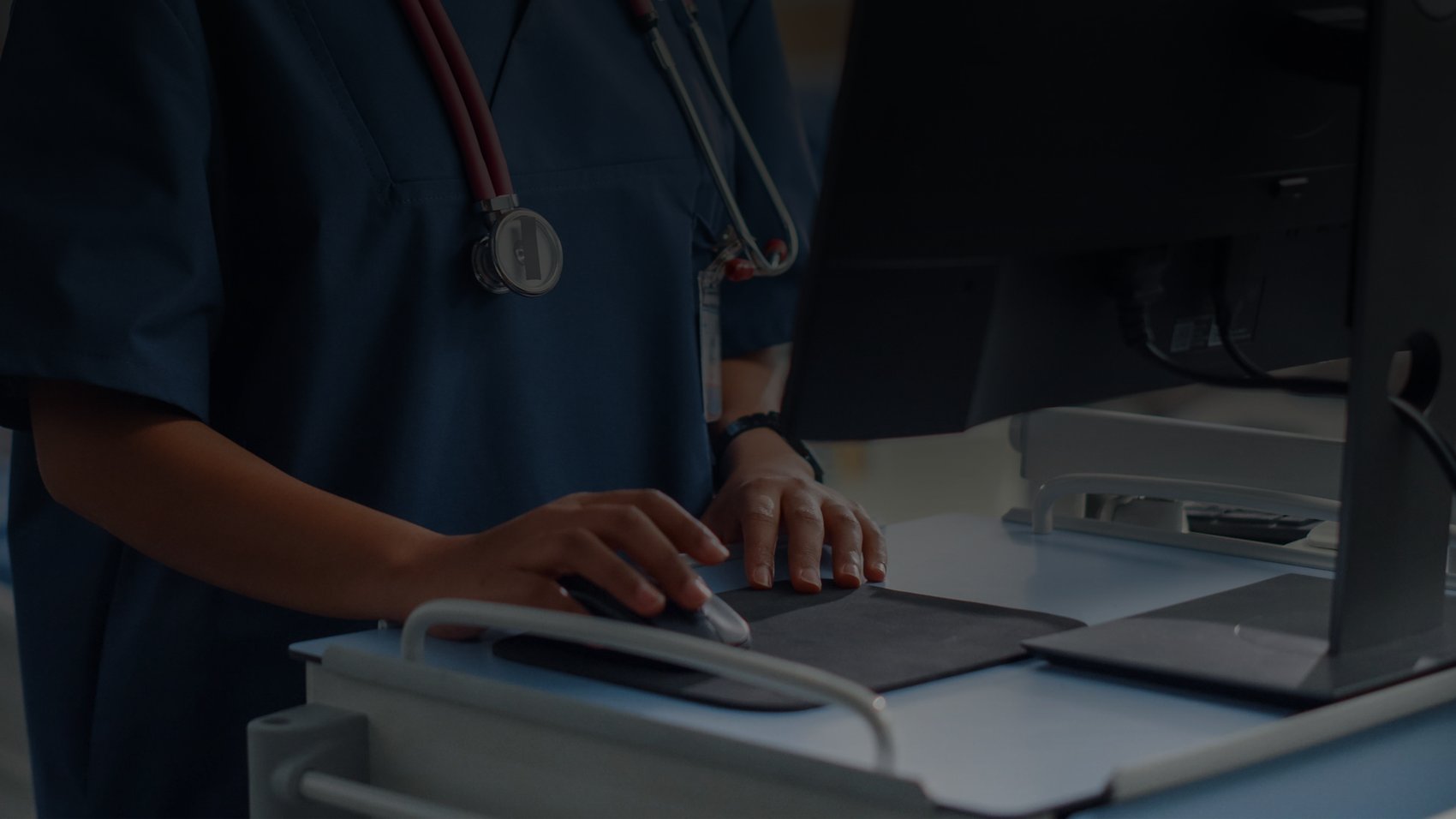 Juno Health EHR being used by a doctor in a hospital setting
