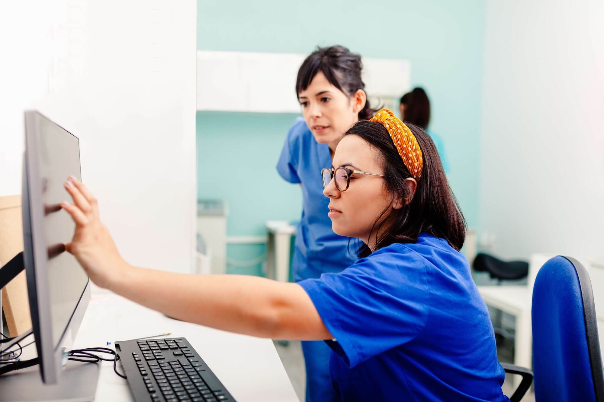 Nurse Using EHR on Computer