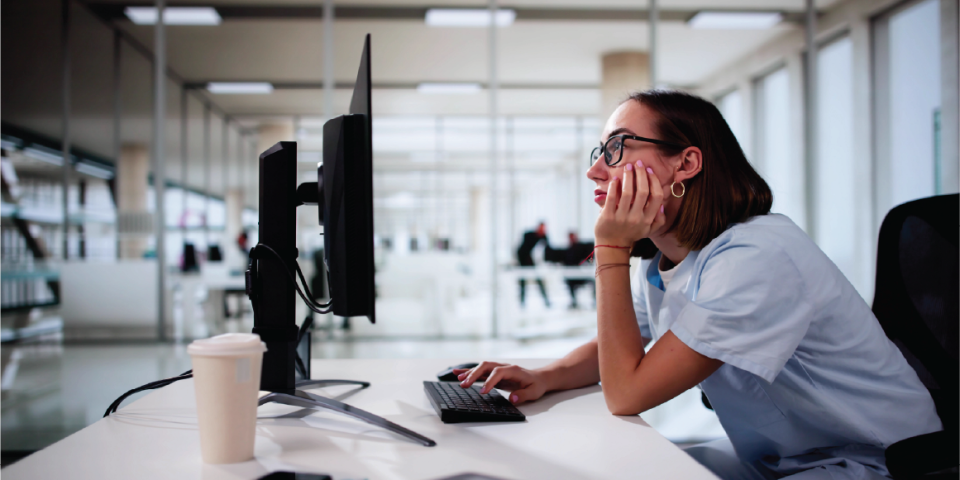 Clinician working at desk