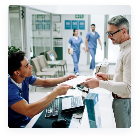 patient signing a form